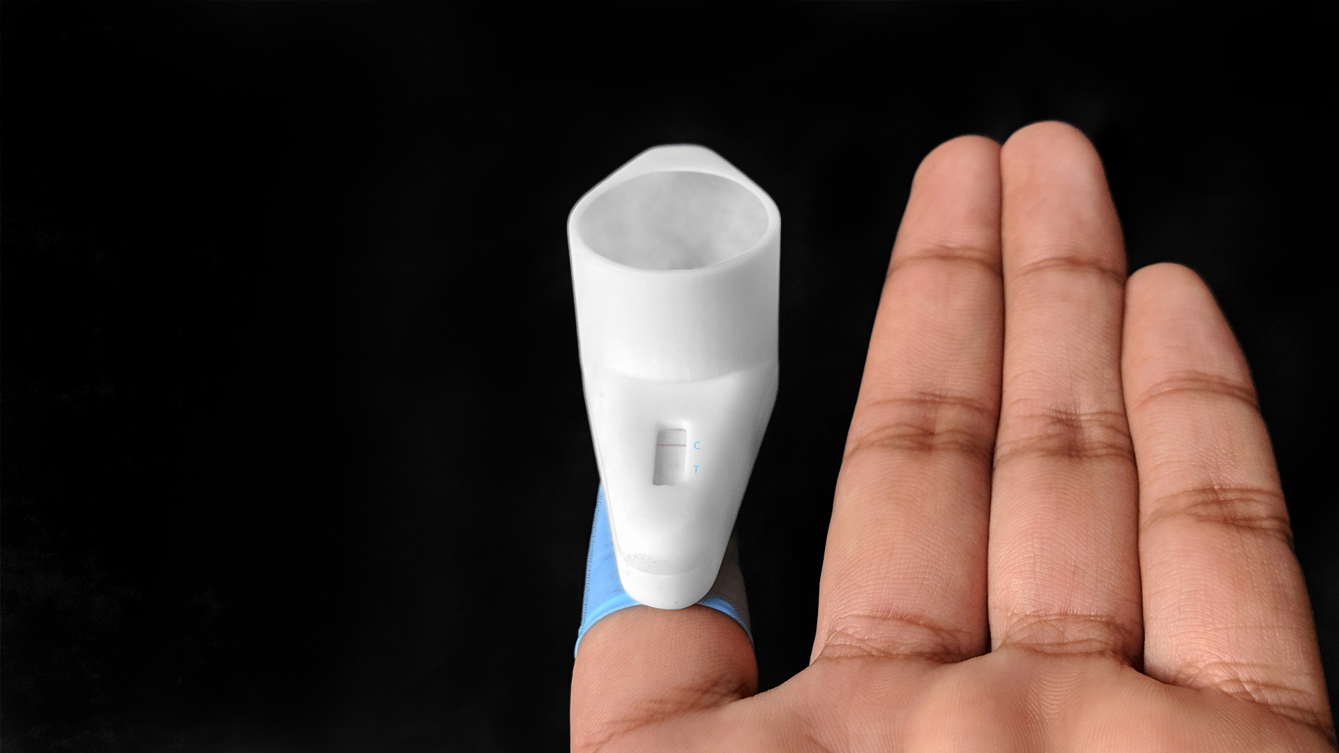 Prototype of Catch HIV detector showing result